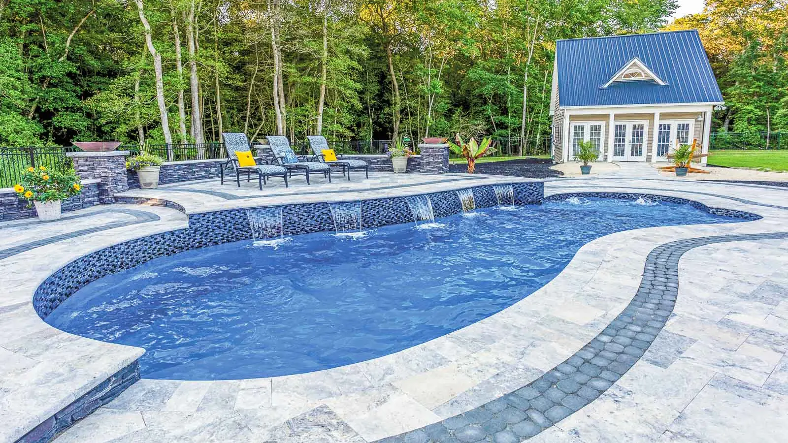 Leisure-Pools-Eclpse-fiberglass-pool The Eclipse, a freeform fiberglass pool with a generous splash pad entrance