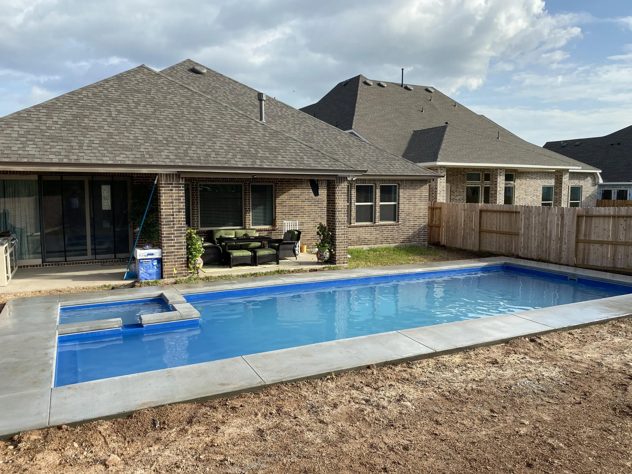A Leisure Pools factory worker performing quality control.